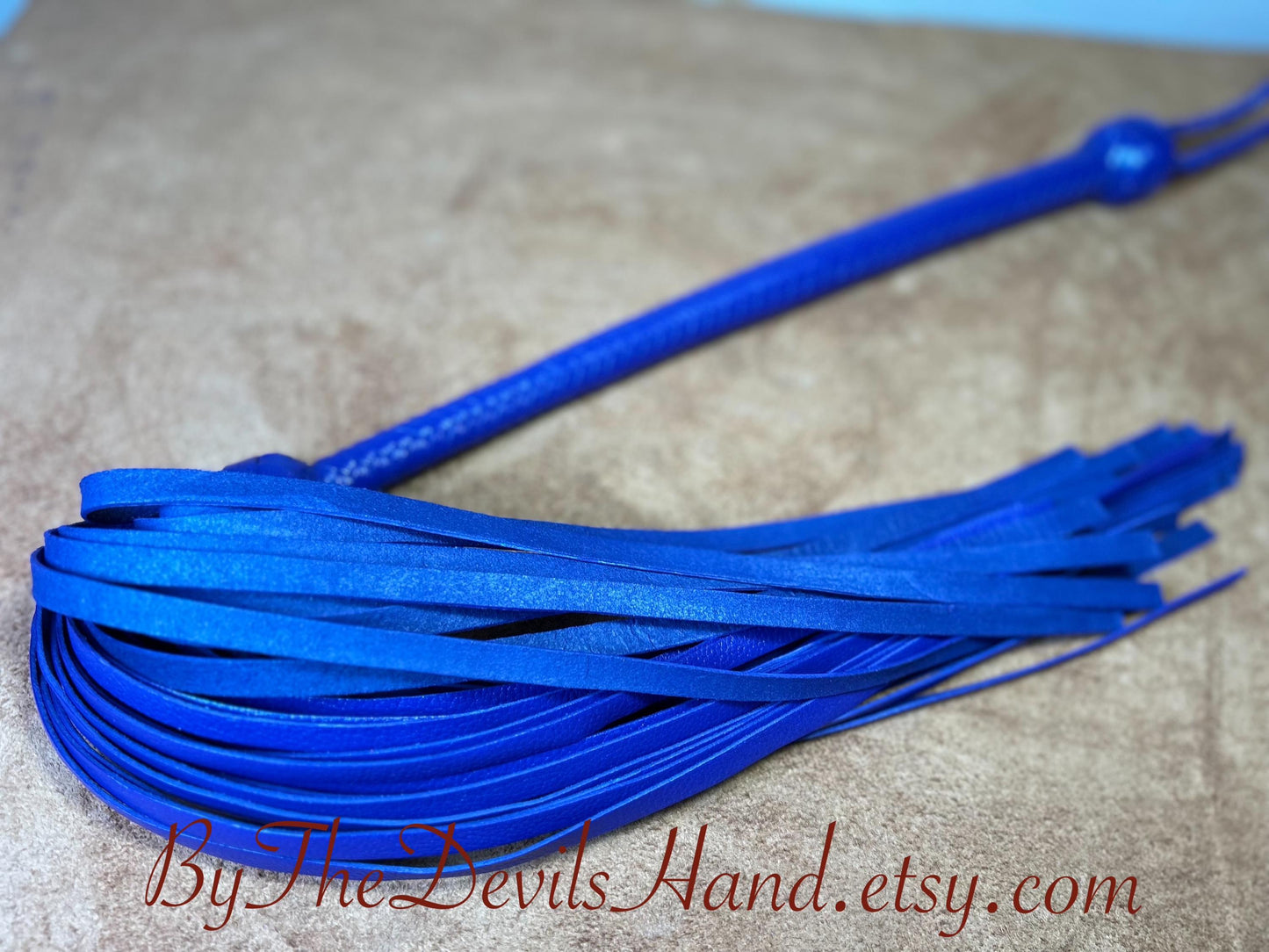 The Opus Flogger  Long Handle  Long Falls  Cyrus Purple  Lush Rich Color Leather  34 Inches