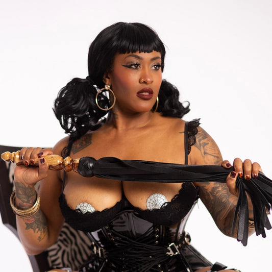 Dean Rodgers @Knotty.Photos (IG) Shooting TheRockaBillyBarbie (IG) Featuring the Cocobolo Buffalo Hide Flogger